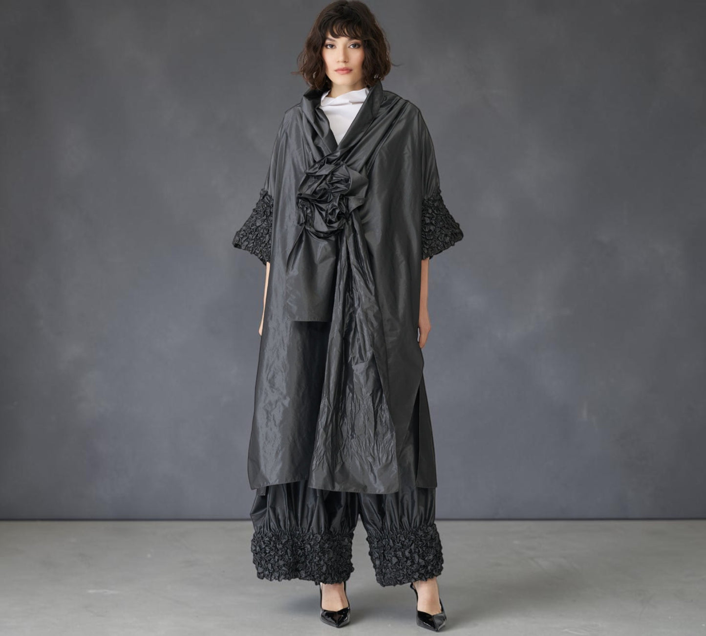 Black Avant-Garde Sculptural Cape with Textured Sleeves & Statement Rosette - Above the Crowd Boutique