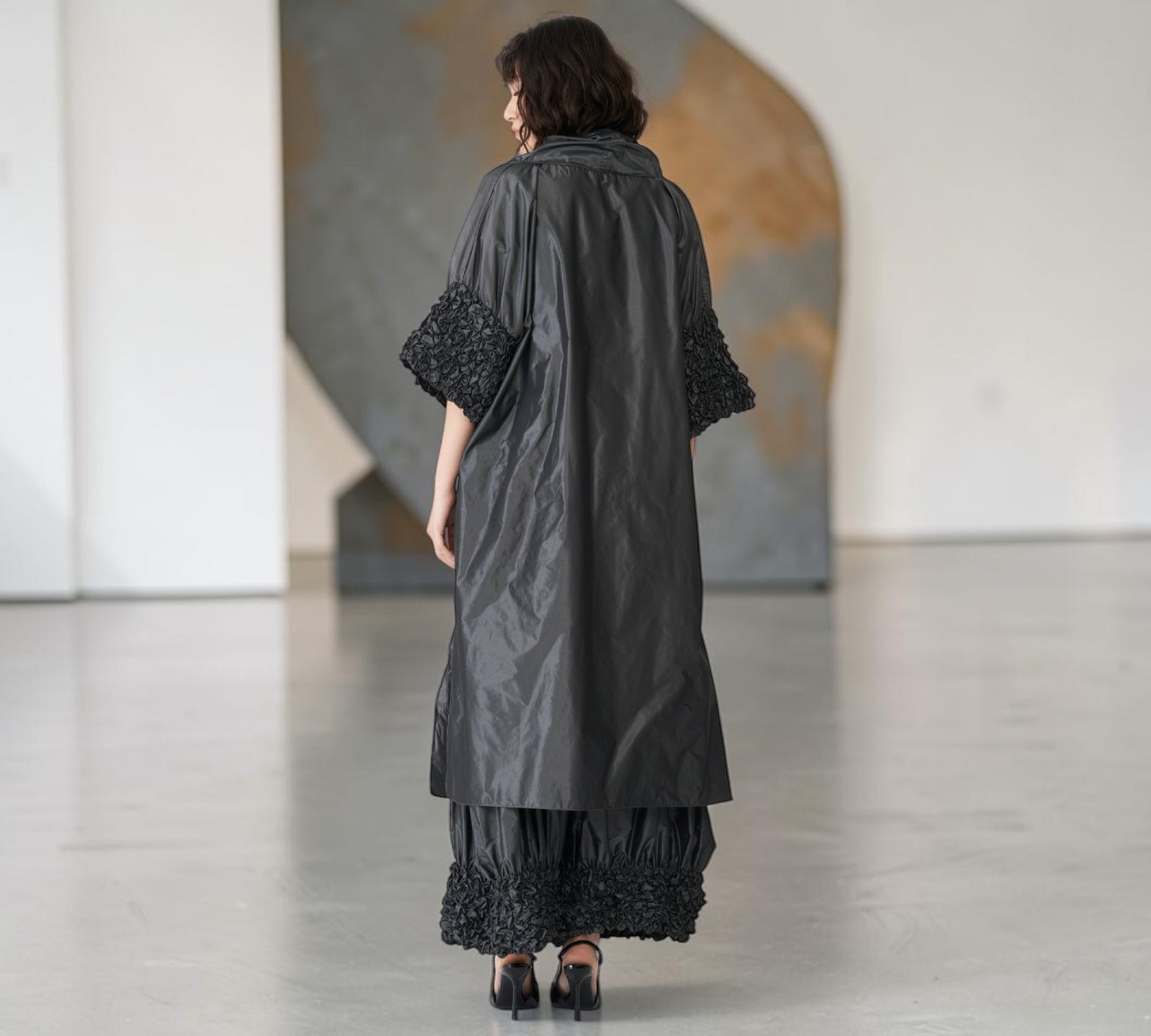 Black Avant-Garde Sculptural Cape with Textured Sleeves & Statement Rosette - Above the Crowd Boutique