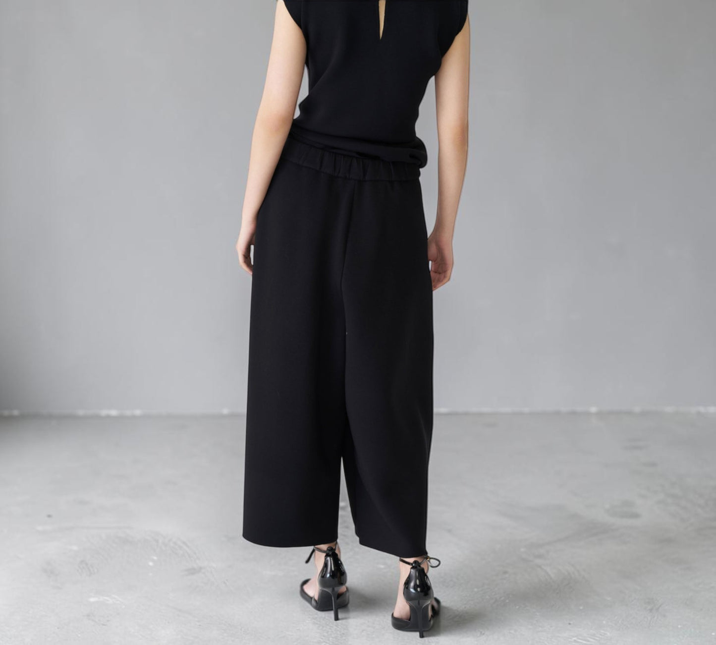 Black Sculptural Wide-Leg Pants with Sheer Mesh Hem Detail