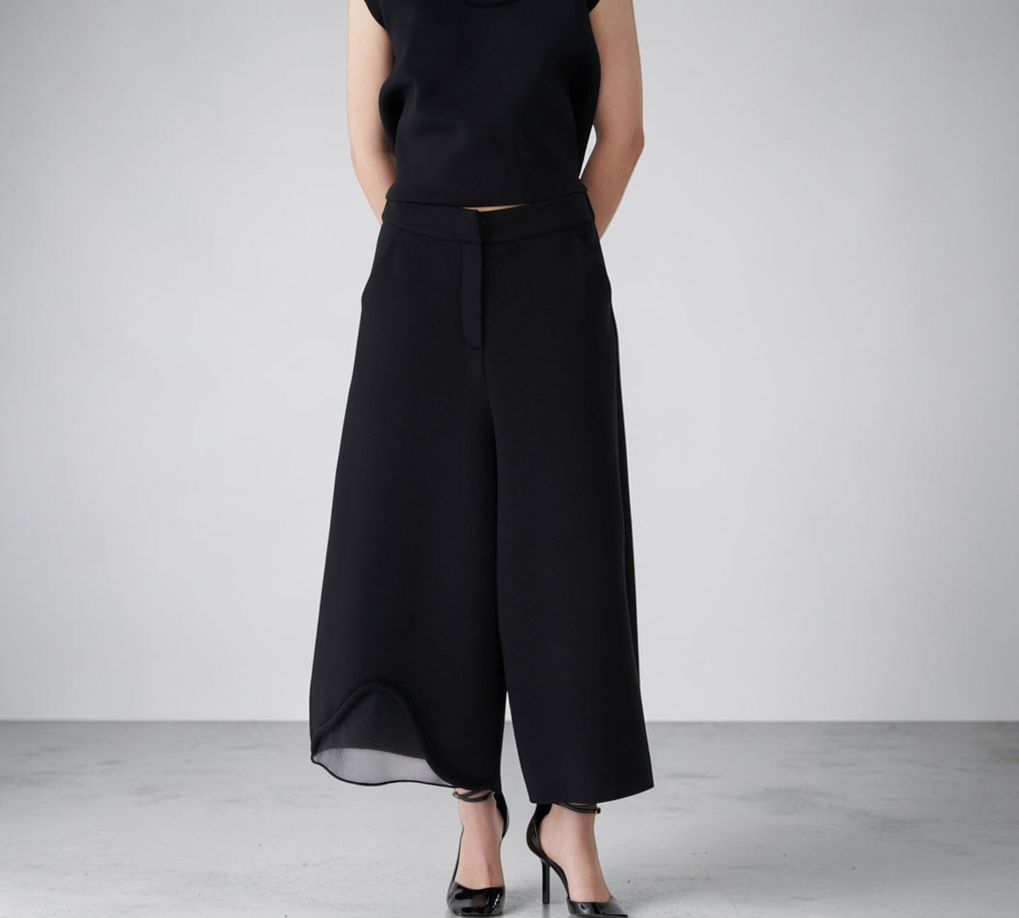 Black Sculptural Wide-Leg Pants with Sheer Mesh Hem Detail