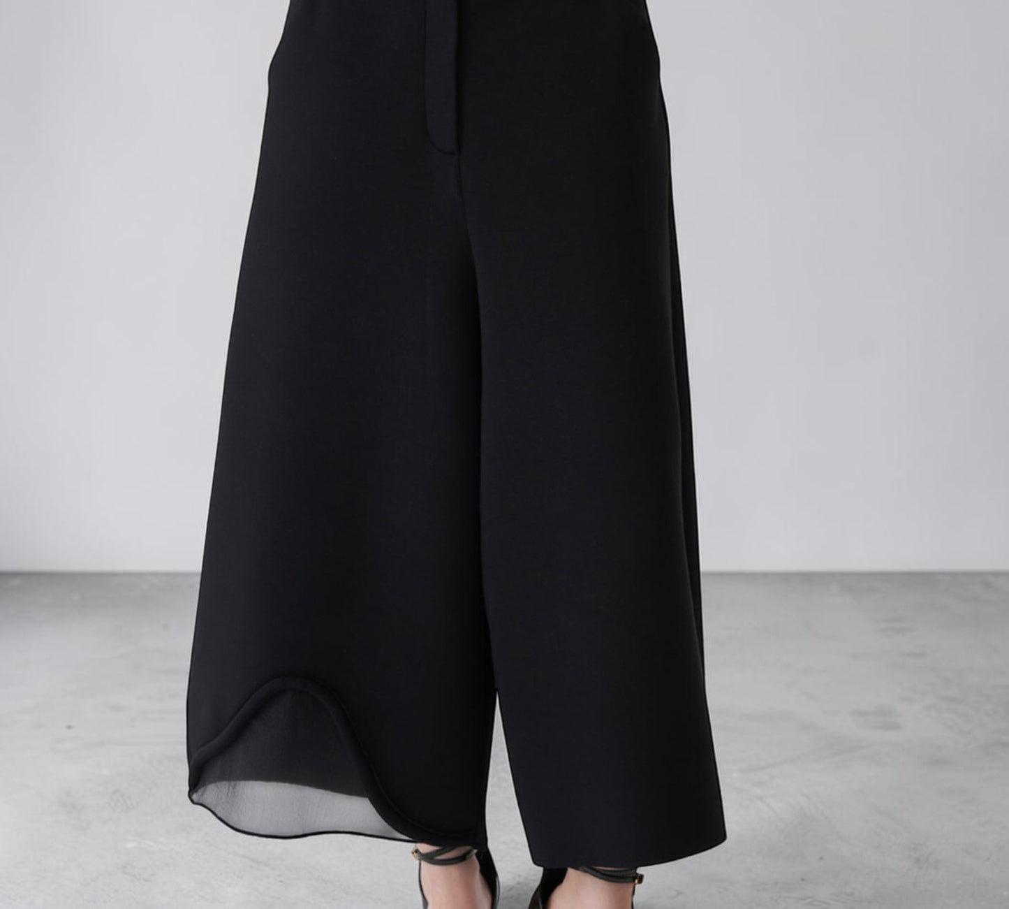 Black Sculptural Wide-Leg Pants with Sheer Mesh Hem Detail