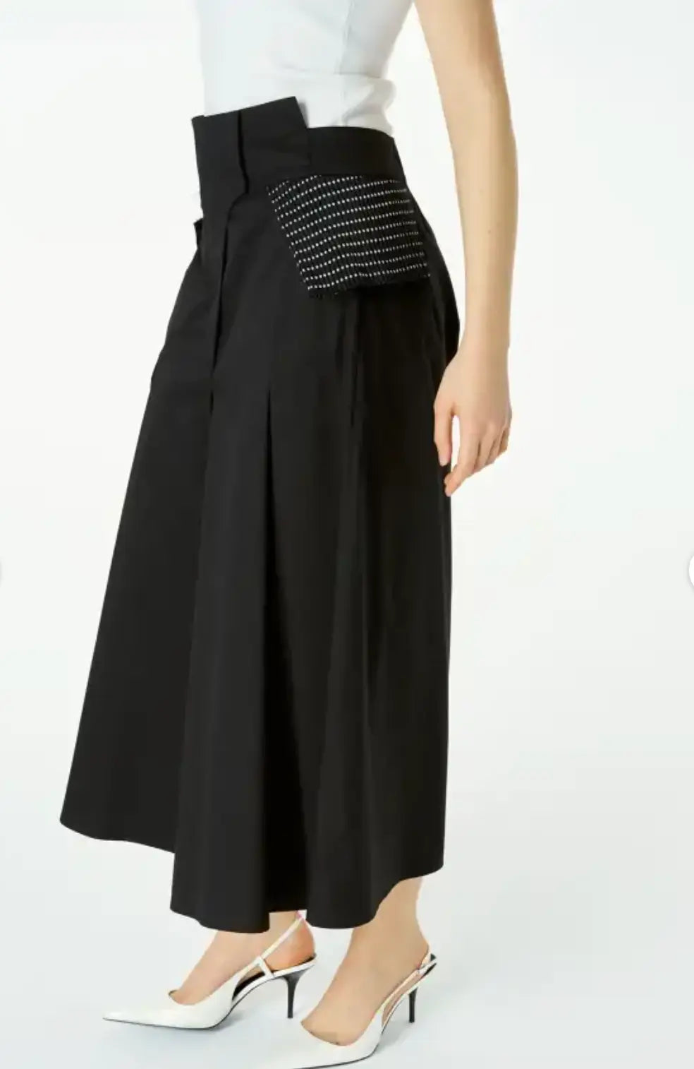 Black skirt with decorative waistband on a white background
