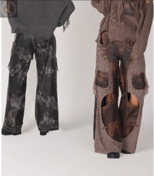 Two pairs of wide-leg pants, one black and one brown with patches, on a white background.