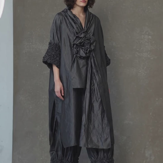 Black Avant-Garde Sculptural Cape with Textured Sleeves & Statement Rosette - Above the Crowd Boutique