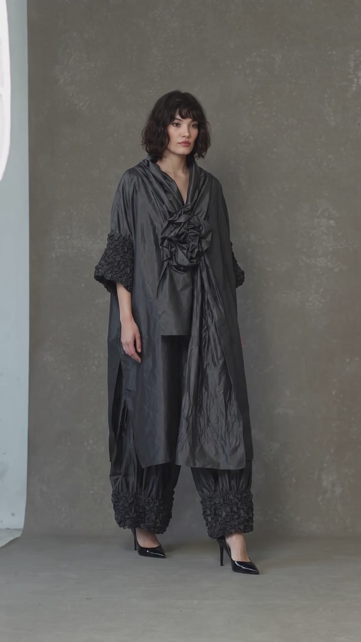 Black Avant-Garde Sculptural Cape with Textured Sleeves & Statement Rosette - Above the Crowd Boutique